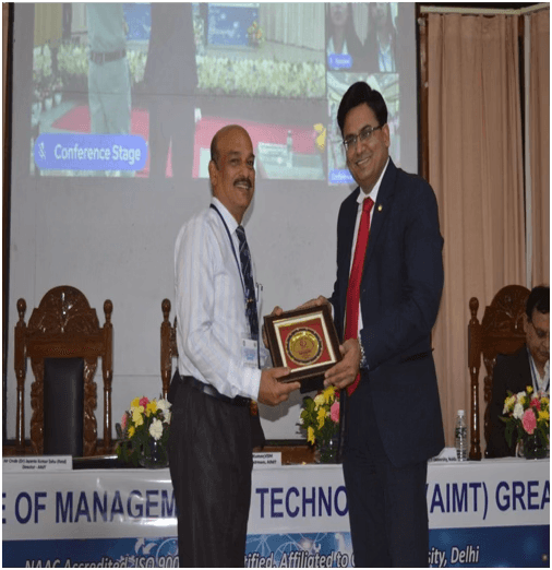 Dr Ajay Rana signing a strategic partnership agreement