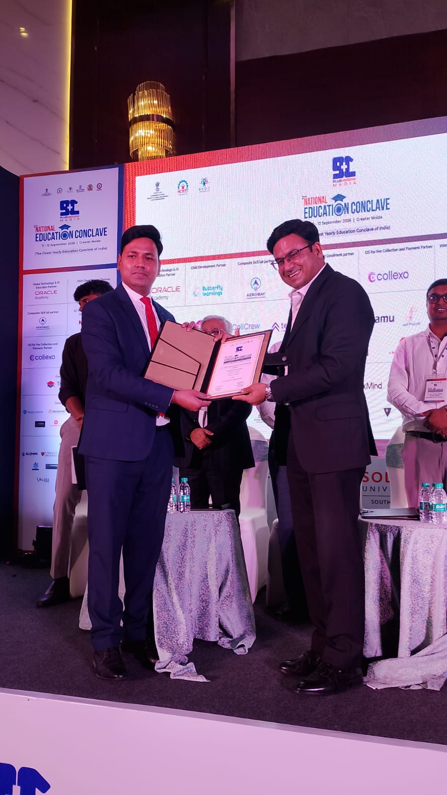 Dr Ajay Rana receiving recognition at education conclave